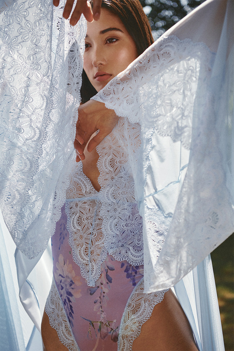 Sheer blue mesh kimono robe by Luciela featuring lightweight, transparent fabric with flowy sleeves and relaxed fit.