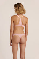 Sheer pink bralette and thong lingerie set by Luciela, featuring delicate fabric and matching design.