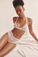 Sheer white lingerie set featuring a bralette and matching boyshorts from Luciela, designed for a delicate and comfortable fit.