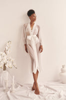 Sheer white mesh kimono robe by Luciela with lightweight, translucent fabric and flowing design.