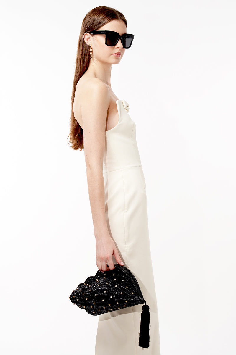 Black wicker shell-shaped evening clutch bag by Emm Kuo, featuring a stylish shell design and compact size.