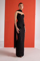 Black embroidered corset set from Joanna Andraos co-ords, featuring detailed embroidery and fitted design, shown from side angle.