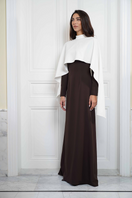 Joanna Andraos ivory evening gown with flowing cape, elegant side view showcasing the luxurious fabric and sophisticated design.