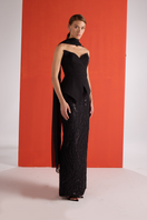 Side view of Joanna Andraos black embroidered corset co-ords set showcasing detailed embroidery and fitted design.
