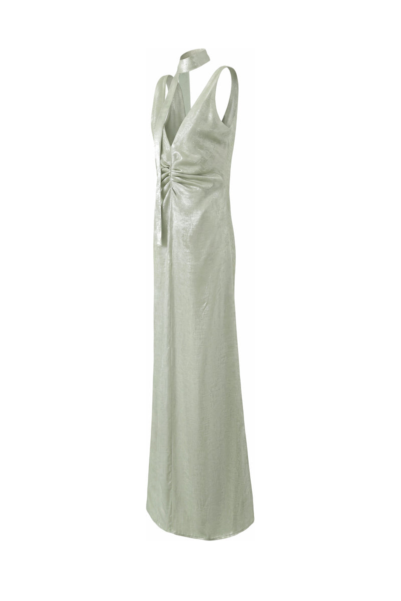 Aisl green pleated V-neck gown shown from the side, featuring elegant fabric and flowing design for formal occasions.