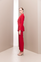 Joanna Andraos red hourglass co-ords suit set featuring a fitted blazer and matching tailored pants, stylish and elegant.