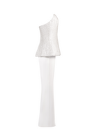 Joanna Andraos white corset top with flared trousers co-ords set, shown from side view with fitted waist and flowing pant legs.