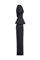 Joanna Andraos black crepe two-piece co-ord set with draped cape, shown from side angle on model.
