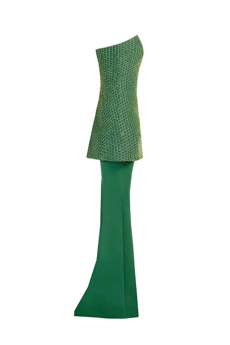 Emerald green corset top and skirt co-ords by Joanna Andraos, shown from the side with fitted silhouette and stylish design.