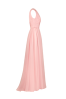 Baby pink one-shoulder gown by Joanna Andraos, elegant side view showcasing the flowing fabric and stylish design.