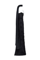 Joanna Andraos black feather corset gown shown from the side, featuring a fitted silhouette and elegant feather detailing.