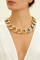 Silvia Gnecchi Diana Gold Chain Necklace with a sleek gold chain design on a neutral background.
