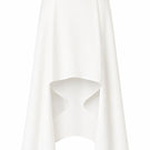 Lili Blanc crepe midi skirt in soft fabric, showcasing a flowing, elegant design with a high waist and subtle pleats.