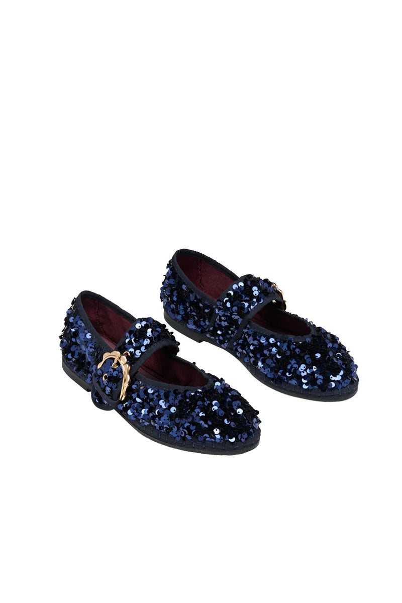 Flabelus Sophie Glinda navy flats with pointed toe and sleek design, shown on model's feet.