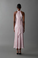 Aisl pink halter maxi dress with matching scarf, styled on a model showcasing the flowing fabric and elegant design.