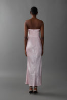 Aisl pink strapless maxi dress displayed from the back, flowing fabric and elegant design perfect for formal or summer occasions.