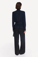 Stylish blue and black belted shirt from DELEGAN, featuring a tailored fit and fashionable design.