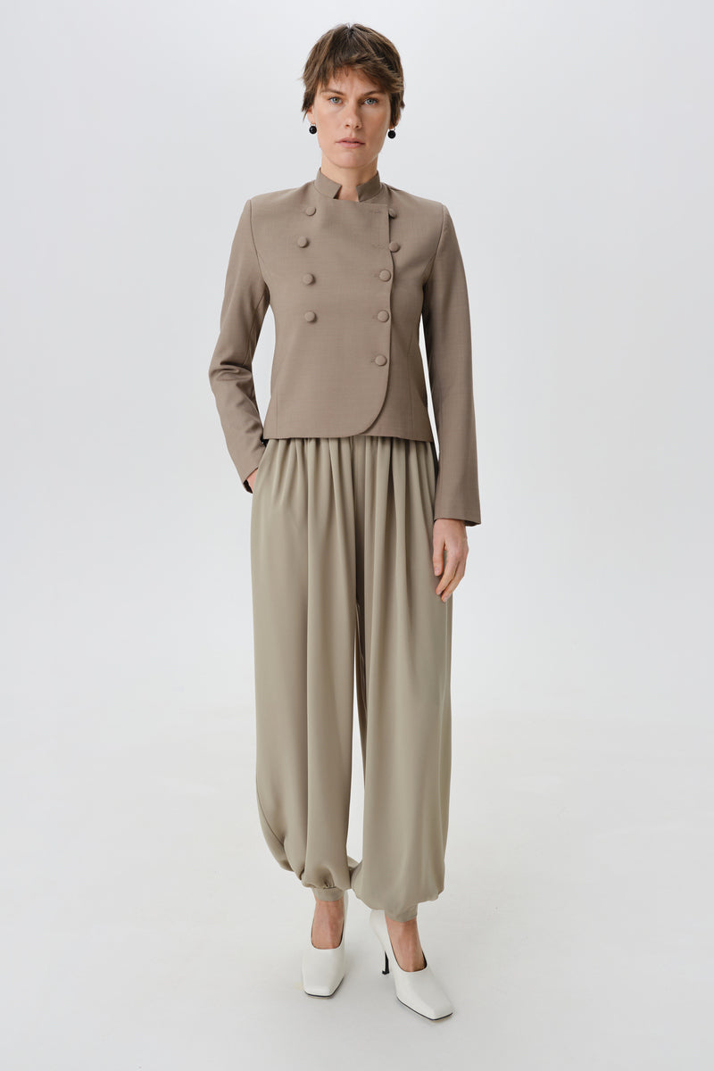 Front view of a stylish DELEGAN crop wool blazer with a tailored fit and classic lapel design.