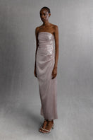 Aisl pleated bodice maxi dress featuring a flowing skirt and elegant design, shown styled side view.