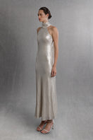Aisl champagne halter maxi dress with a matching scarf, flowing fabric, and elegant design, styled on a model for a formal look.