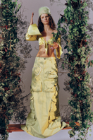 Green denim cargo maxi skirt by Sudi Etuz, featuring a flowy design with cargo pockets and a stylish, casual look.