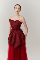 Red floral tweed and organza gown by Happy Clothing, featuring intricate floral patterns and elegant layered fabric.