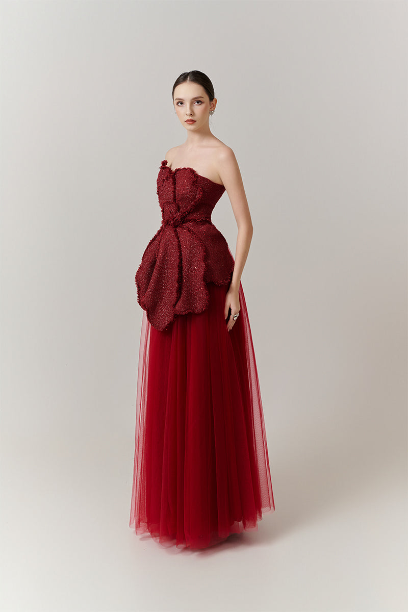Elegant red floral tweed and organza gown by Happy Clothing, featuring intricate floral patterns and a flowing silhouette.