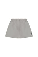 Embroidered boxer shorts by TAGG featuring a stylish logo design, made from soft fabric for comfortable wear.