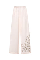 Embroidered TAGG pants with elastic waistband, stylish and comfortable casual pants with detailed embroidery and relaxed fit.