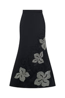 Embroidered whale design maxi skirt by TAGG, featuring colorful whale embroidery on lightweight fabric.