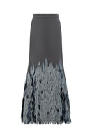Hand-embroidered anthracite whale motif maxi skirt by TAGG, featuring intricate whale embroidery on flowing fabric.