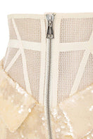 Tayfun Kaba cream corset pants with tailored fit and stylish design, featuring a high waist and sleek silhouette.