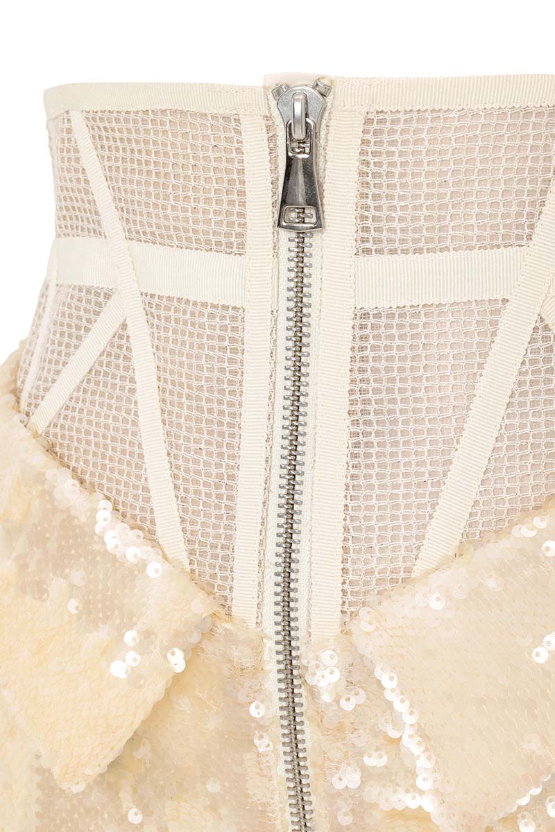 Tayfun Kaba cream corset pants with tailored fit and stylish design, featuring a high waist and sleek silhouette.