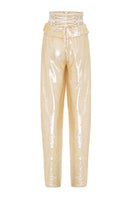 Tayfun Kaba cream corset pants featuring a fitted waist and tailored design, showcased on a model in a stylish urban setting.