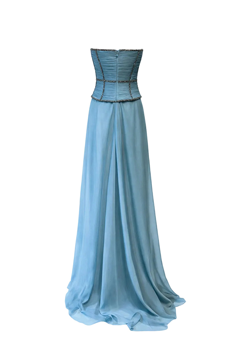 Blue Thalina maxi dress by URBAN MUSE, flowing fabric with a fitted bodice and elegant design, displayed on a hanger.