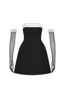 Black monochrome mini dress by Margée Atelier featuring a sleek, fitted silhouette and stylish round neckline.
