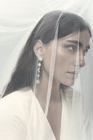 Silver earrings named The Justice by Lavani Jewels, featuring a sleek, modern design with intricate detailing.
