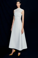 White pleating shoulder maxi dress by TONYY, featuring flowy fabric and elegant design, perfect for summer or special occasions.