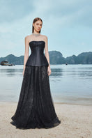 Black classic corset and flowing skirt co-ords set by Tracy Studio, featuring a fitted corset top and elegant, flowing skirt.