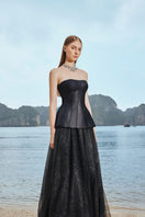 Black classic corset and flowing skirt set from Tracy Studio, stylish co-ords with fitted top and flowing skirt in black.