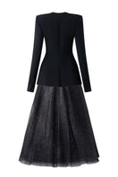Black long sleeve blazer and skirt set by Tracy Studio, featuring a trapezoid neckline in a coordinated stylish ensemble.