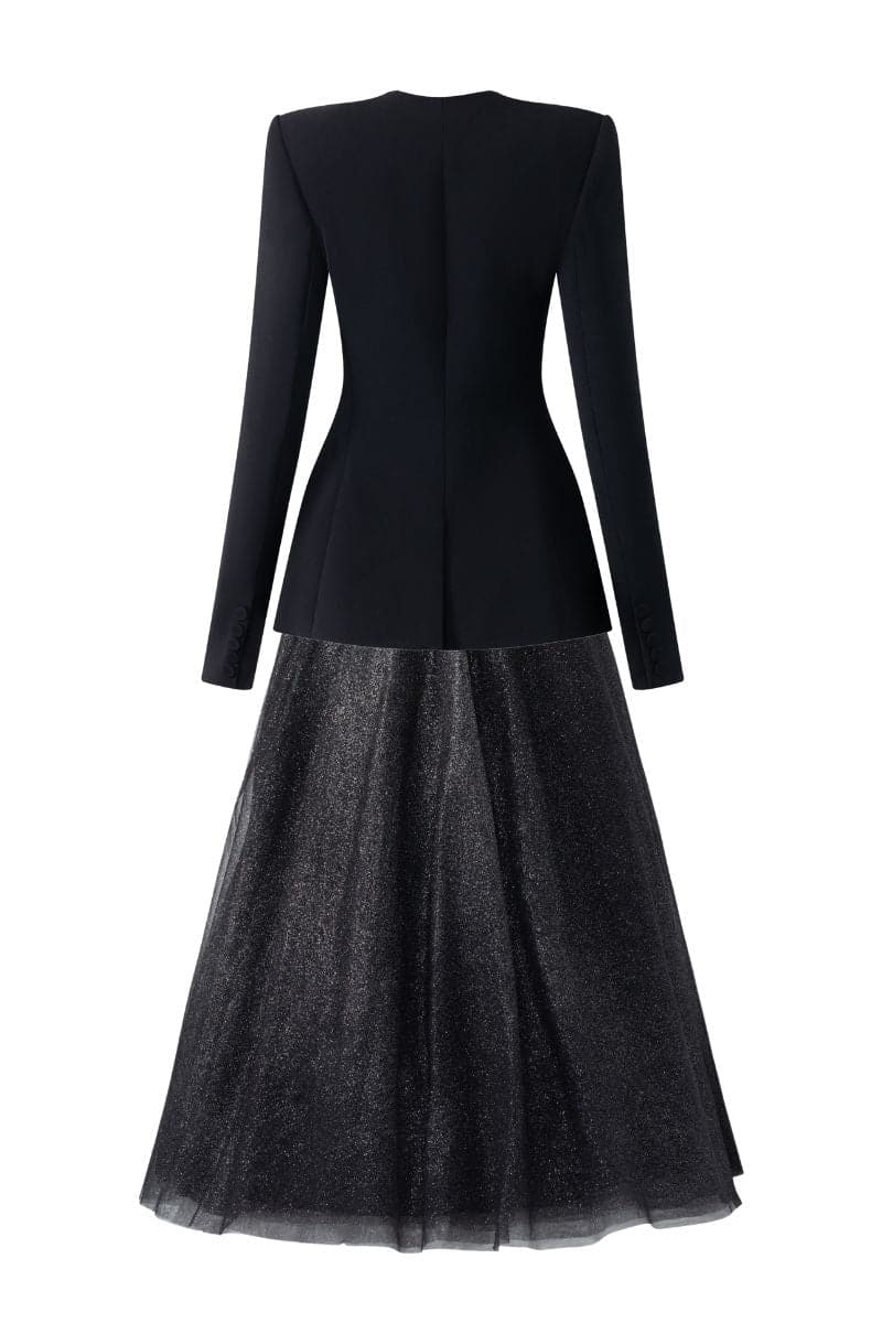 Black long sleeve blazer and skirt set by Tracy Studio, featuring a trapezoid neckline in a coordinated stylish ensemble.