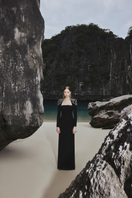 Black Tracy Studio long sleeve bodycon gown with trapezoid neckline, full-length dress, form-fitting design.
