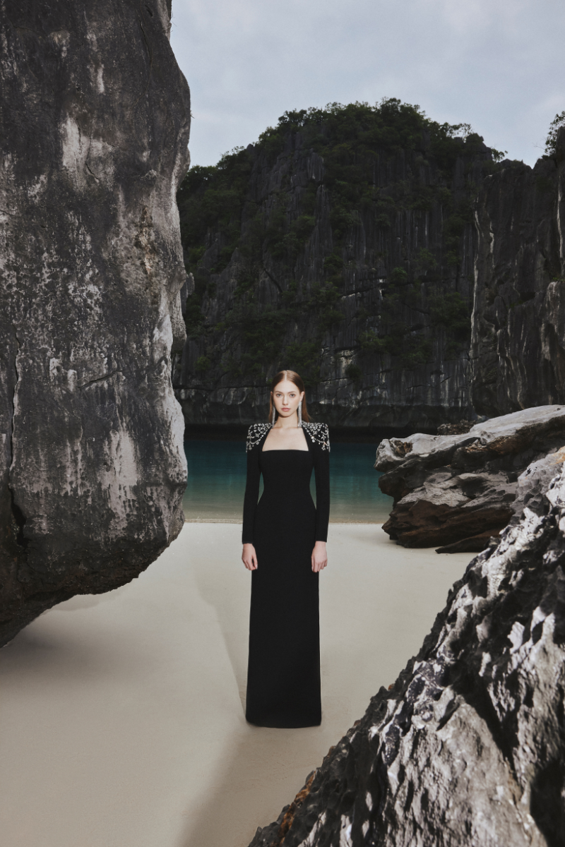 Black Tracy Studio long sleeve bodycon gown with trapezoid neckline, full-length dress, form-fitting design.