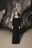 Black Tracy Studio long sleeve trapezoid neckline bodycon gown, full-length dress with fitted silhouette and elegant design.