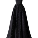Black strapless gown with stone embellishments by Tracy Studio, featuring a full-length design and elegant fit.