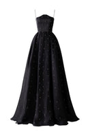 Black strapless gown with stone embellishments by Tracy Studio, featuring a full-length design and elegant fit.