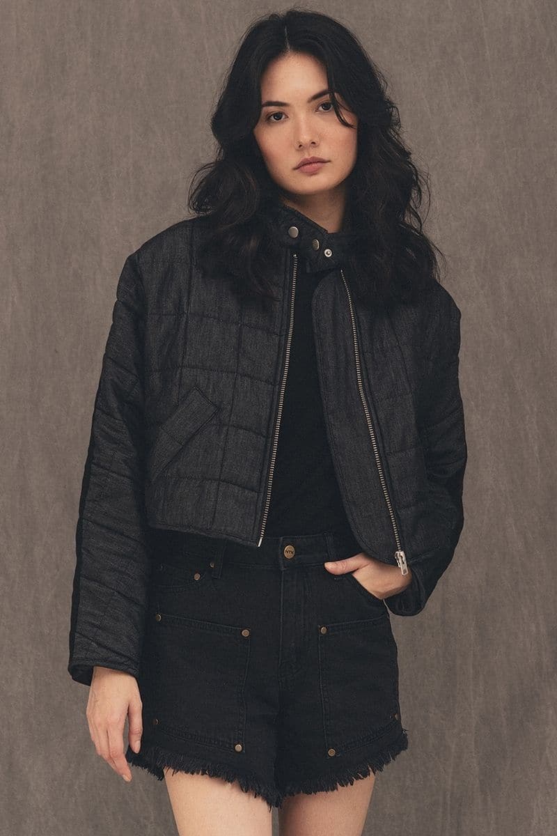 TT Studios Caroline Doyers cropped denim jacket, stylish casual jacket with a fitted silhouette, shown on a model.