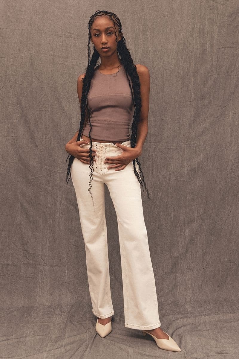 Cream contrast Mikey straight leg jeans by TT Studios, shown in a casual fit on a model.
