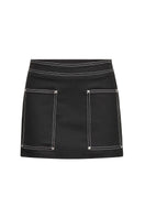 Denielle William St TT Studios denim mini skirt shown on a model, featuring classic blue denim and a fitted style.